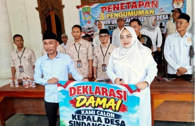 Satu Spanduk, Dua Hati untuk Sindangmulya: Indahnya Janji Suci Rijal Efendi S.H dan R.Selpia Indriyani Jaga Kedamaian Desa